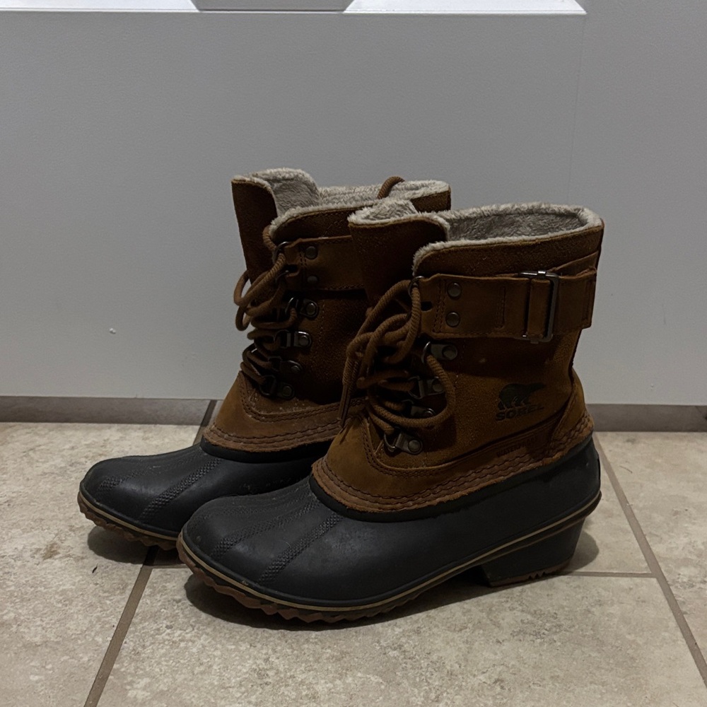 Sorel Tan and Black Lace-Up Boots
